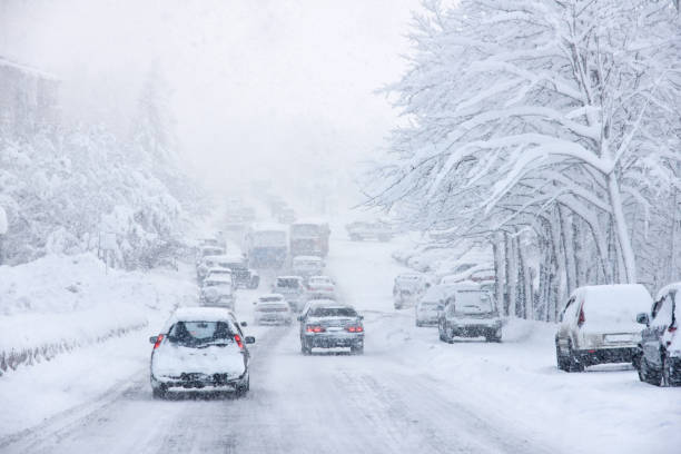 Snowstorm, Poor Visibility,slick Roads And Lots Of Traffic