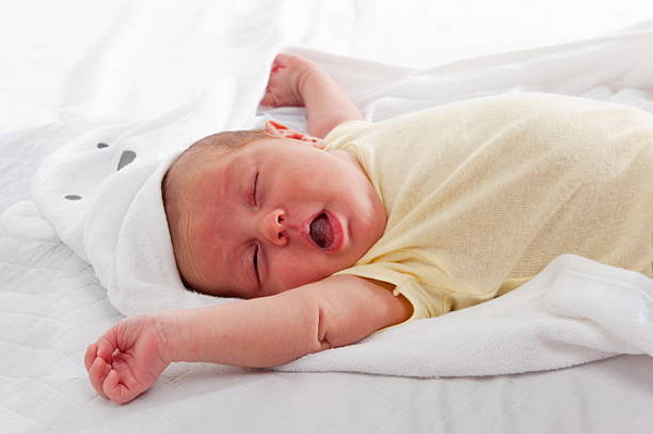 Beautiful Newborn Yawning Studio Shot