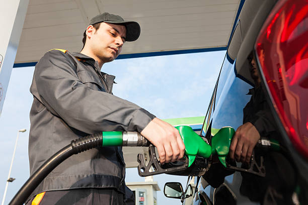 Gas Station Attendant At Work